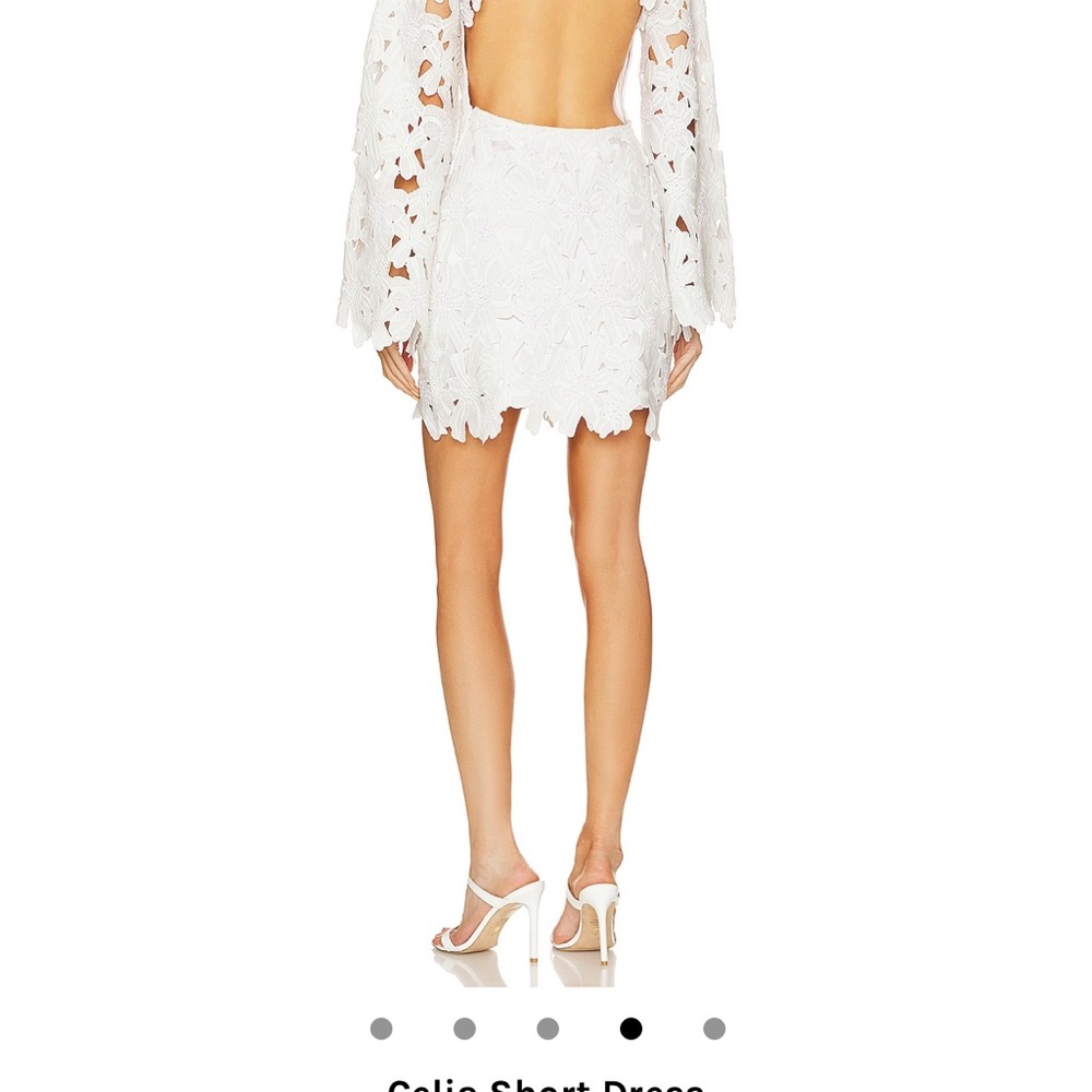 Selling my bridal rehearsal dress — only worn once. dry cleaned after. No damage